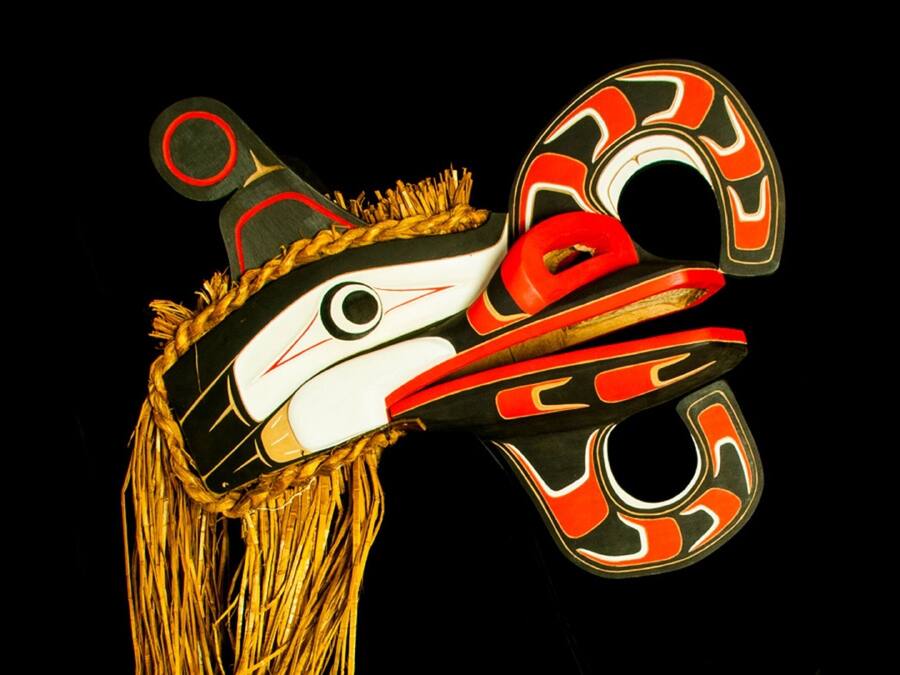 A carved wooden mask with intricate designs.