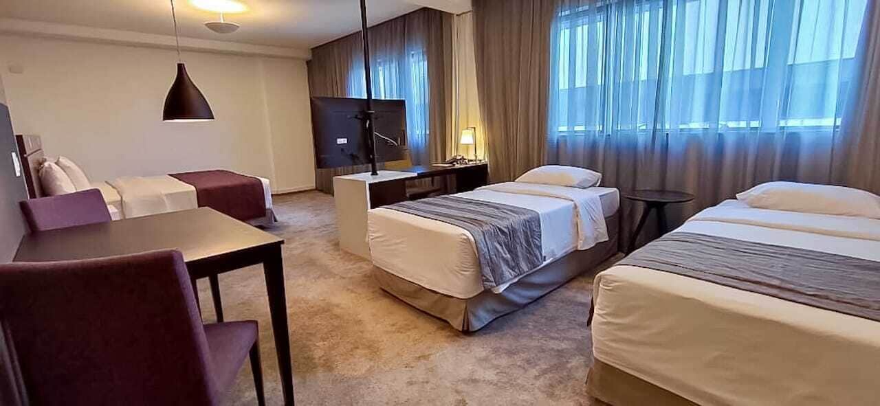 quadruple room | 1 bedroom, minibar, in-room safe, desk