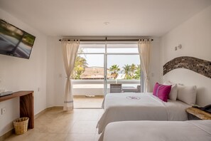Deluxe Room, 2 Double Beds, Partial Sea View | In-room safe, iron/ironing board, free WiFi, bed sheets - Hotel Rockaway (Puerto Escondido)