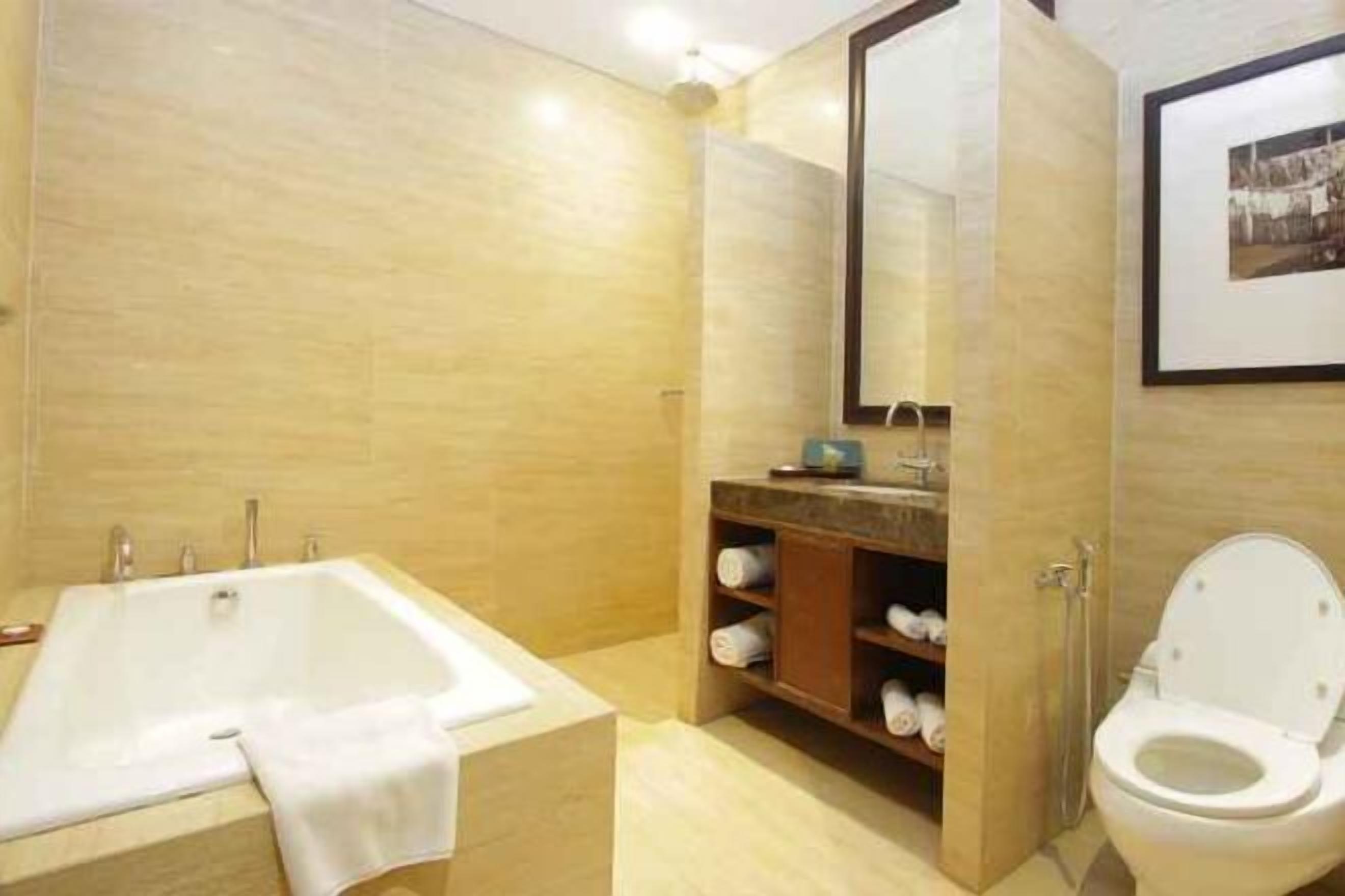 Bathroom | Shower, free toiletries, slippers, towels