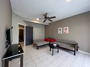 Deluxe Apartment, 2 Bedrooms, Sea View | Living area | Flat-screen TV - Perdana Serviced Apartment & Resorts (Langkawi)