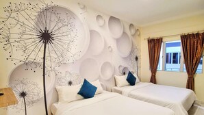A hotel room with two beds, a wall mural, and a window with curtains. - Perdana Serviced Apartment & Resorts (Langkawi)