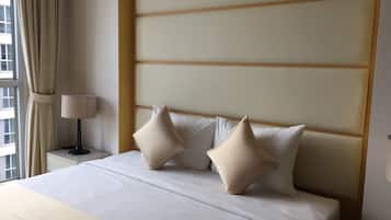 Restful retreat with a large bed and comfortable seating area.