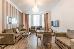 Deluxe One Bedroom Apartment | Living area