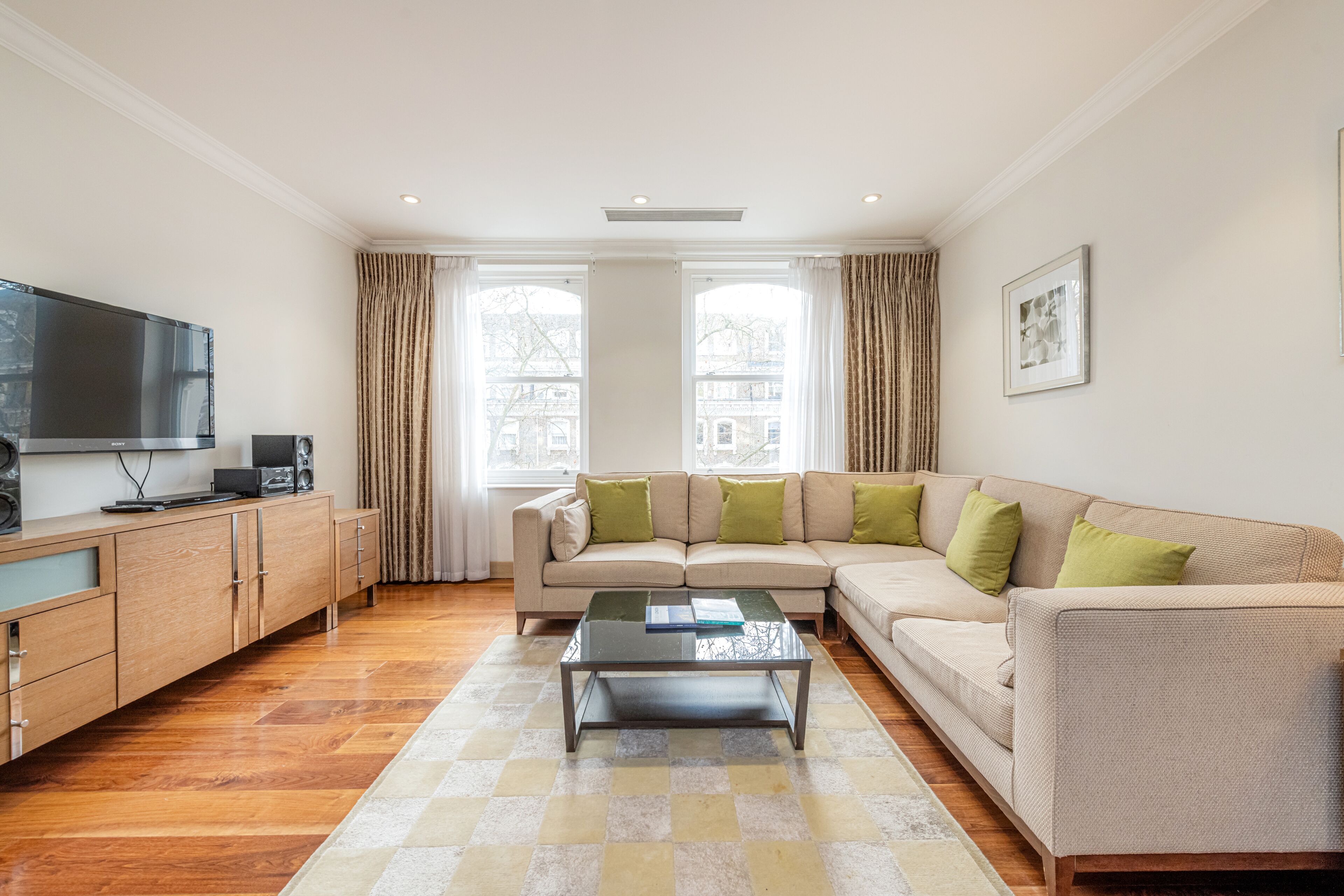 Executive Apartment, 2 Bedrooms | Living area | LCD TV, DVD player, iPod dock