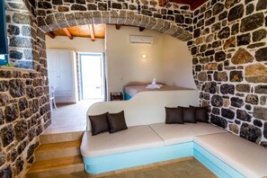 xxxBasic House, Ground Floor | Living area | Flat-screen TV - Pserimos Villas (Kalymnos)