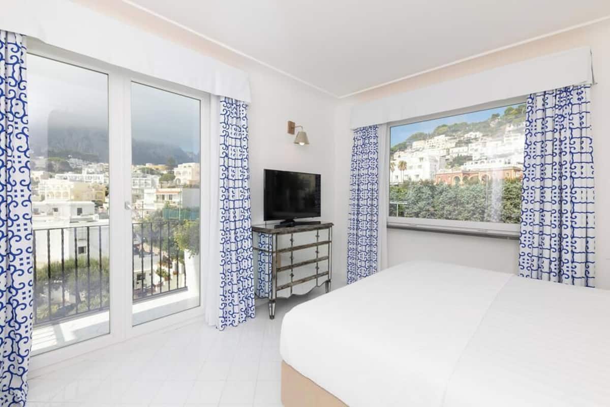 Superior Suite, 2 Bedrooms, Sea View | 1 bedroom, minibar, in-room safe, individually decorated