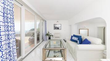 Superior Suite, 2 Bedrooms, Sea View | Living area | Flat-screen TV