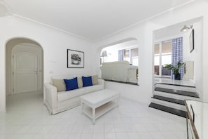 Superior Suite, 2 Bedrooms, Sea View | Living area | Flat-screen TV