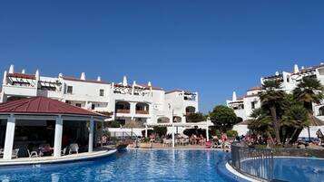 Outdoor pool, pool umbrellas, pool loungers