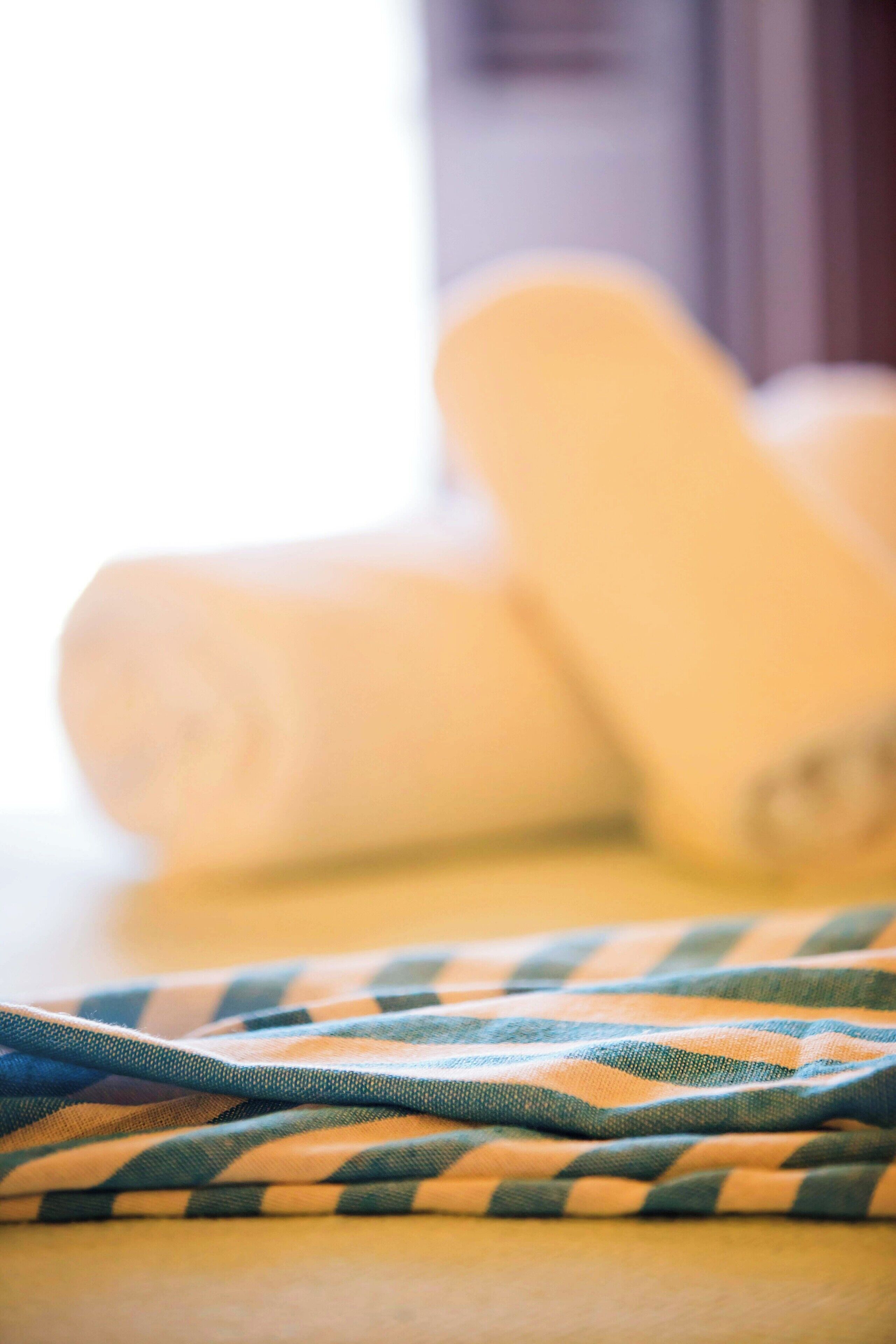 A close-up of a fabric with a checkered pattern.