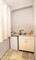 Family Studio no view - Interior Room | Private kitchen | Fridge, stovetop, coffee/tea maker, cookware/dishes/utensils