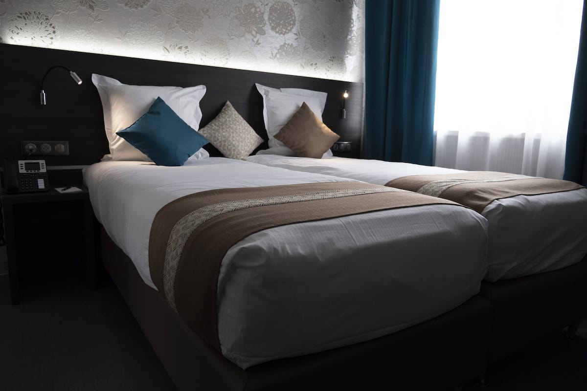 comfort twin room | premium bedding, pillow-top beds, in-room safe, desk