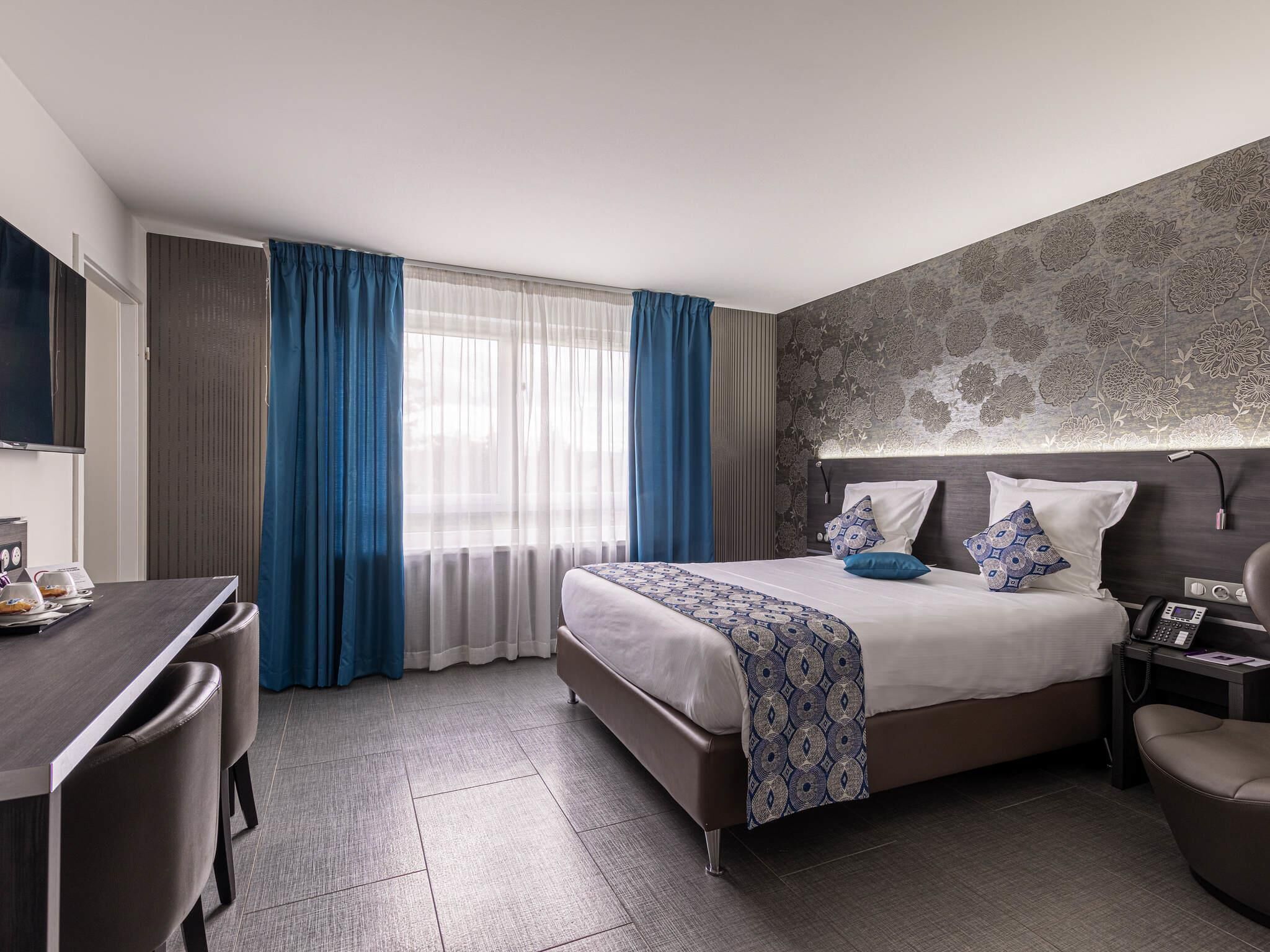 Premium bedding, pillowtop beds, in-room safe, desk