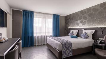 Premium bedding, pillow-top beds, in-room safe, desk