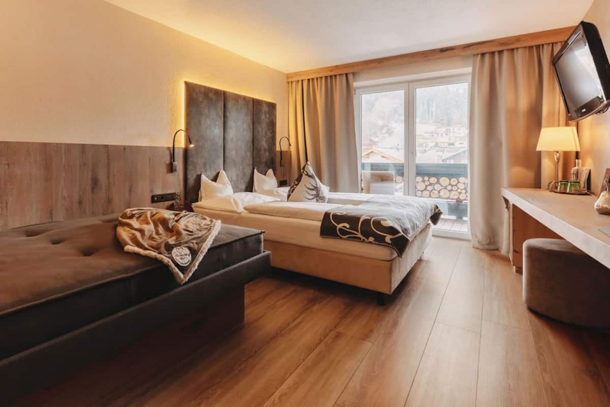 junior suite, mountain view | 2 bedrooms, minibar, in-room safe, desk