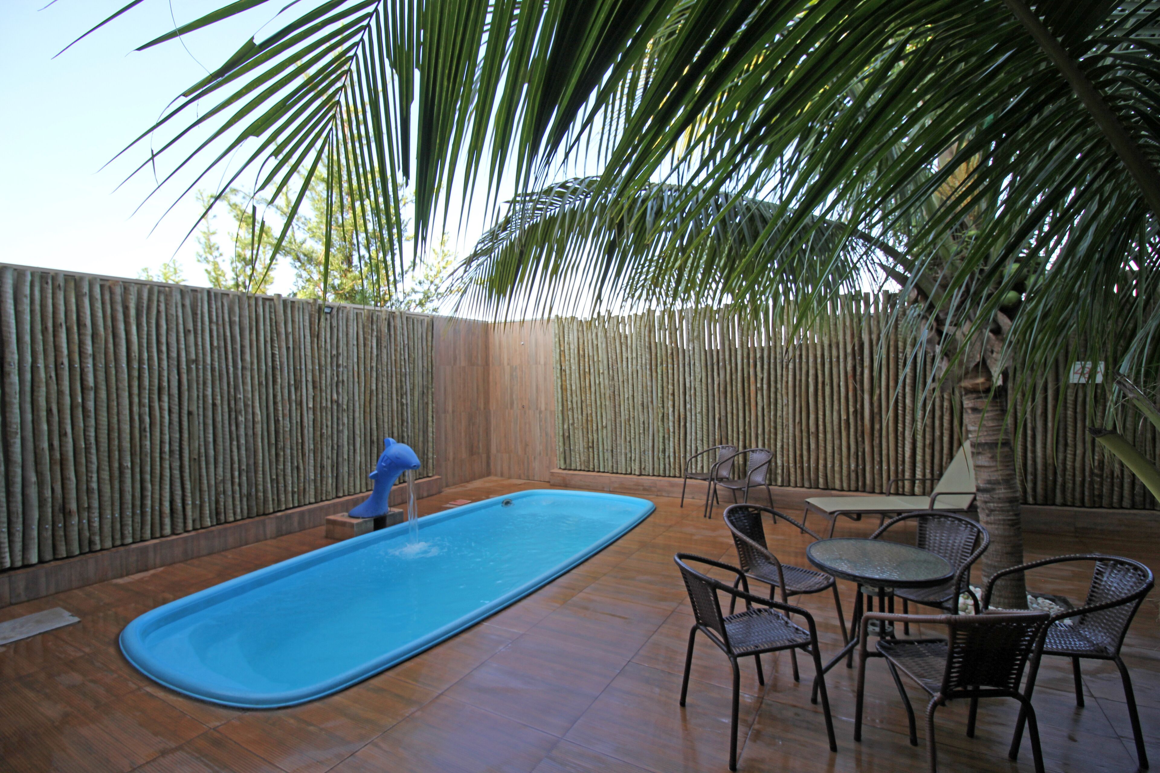 outdoor pool, pool umbrellas, pool loungers