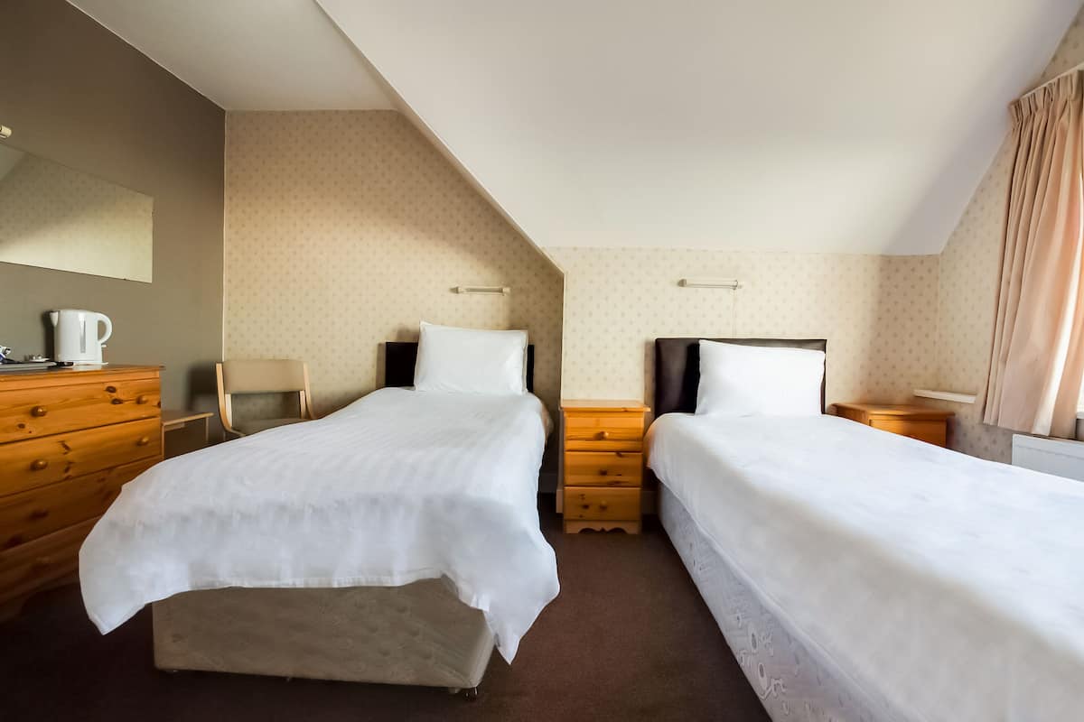 Standard Twin Room, 2 Twin Beds | Cribs (free), rollaway beds (surcharge), WiFi (free), bed sheets
