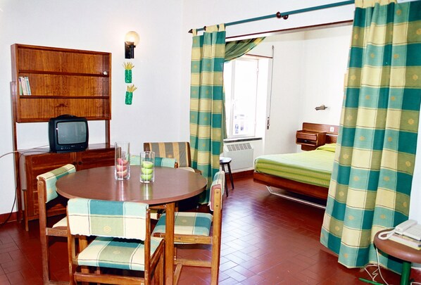 Studio, Balcony | Living area