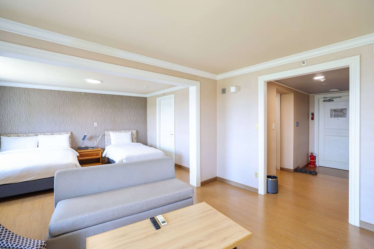 Suite, Multiple Beds, Non Smoking (Oversized) | 1 bedroom, in-room safe, soundproofing, iron/ironing board