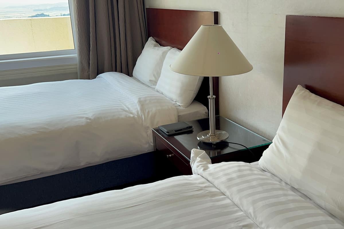 Room, Multiple Beds, Non Smoking | 1 bedroom, in-room safe, soundproofing, iron/ironing board