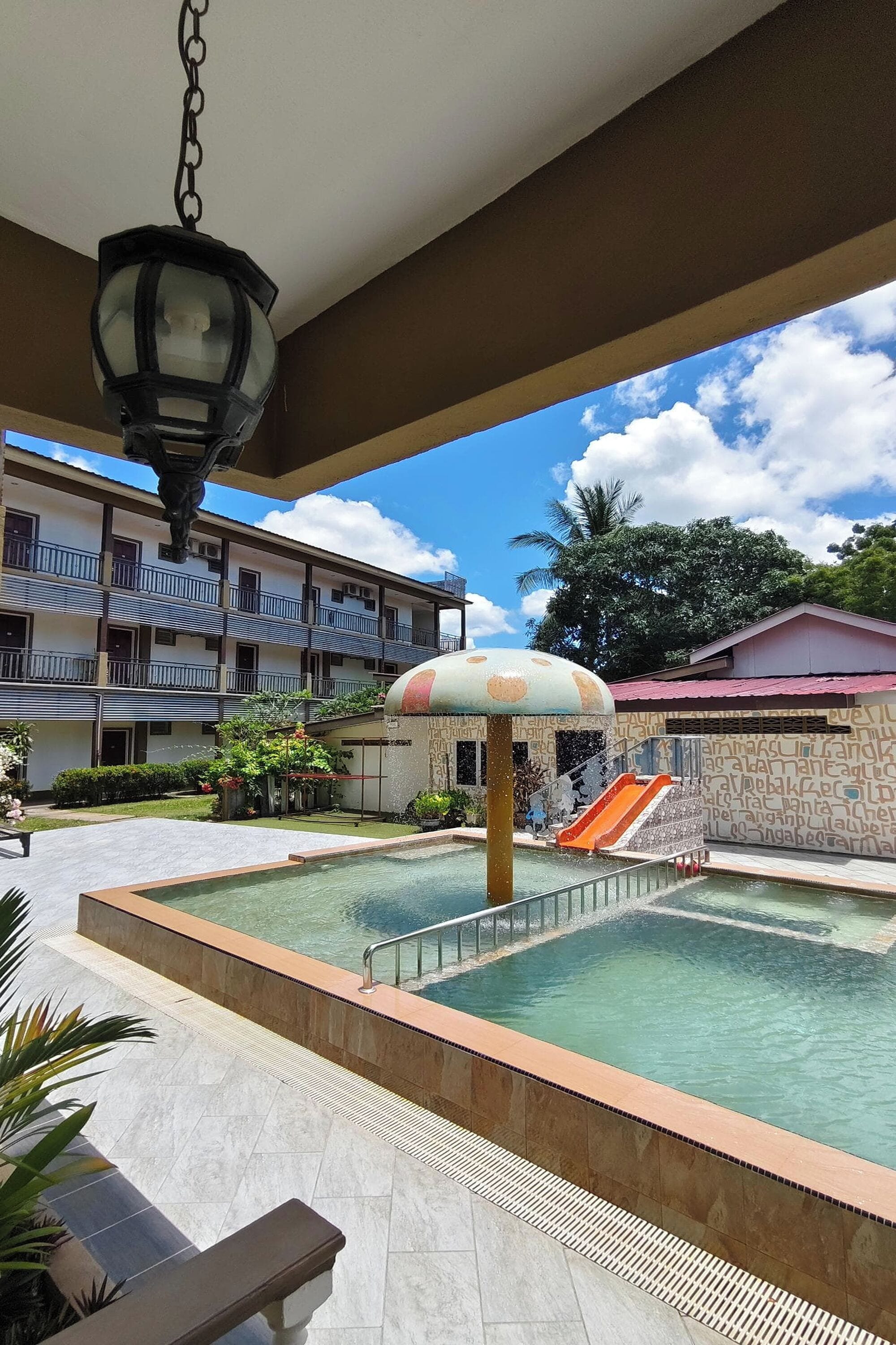 Deluxe Room, Pool View | In-room safe, desk, iron/ironing board, rollaway beds