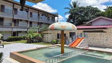 Deluxe Room, Pool View | In-room safe, desk, iron/ironing board, rollaway beds