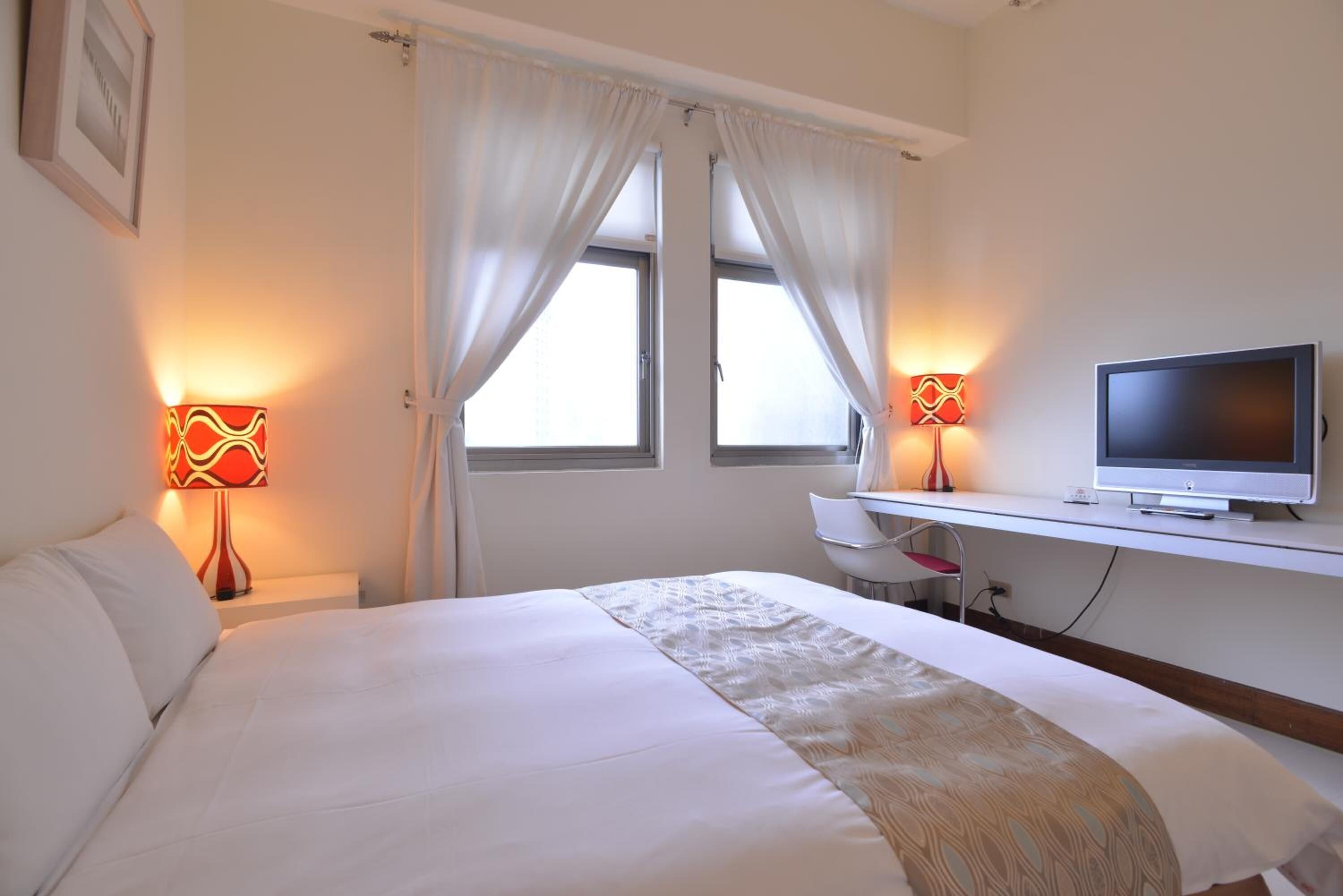 blackout curtains, iron/ironing board, rollaway beds, free wifi