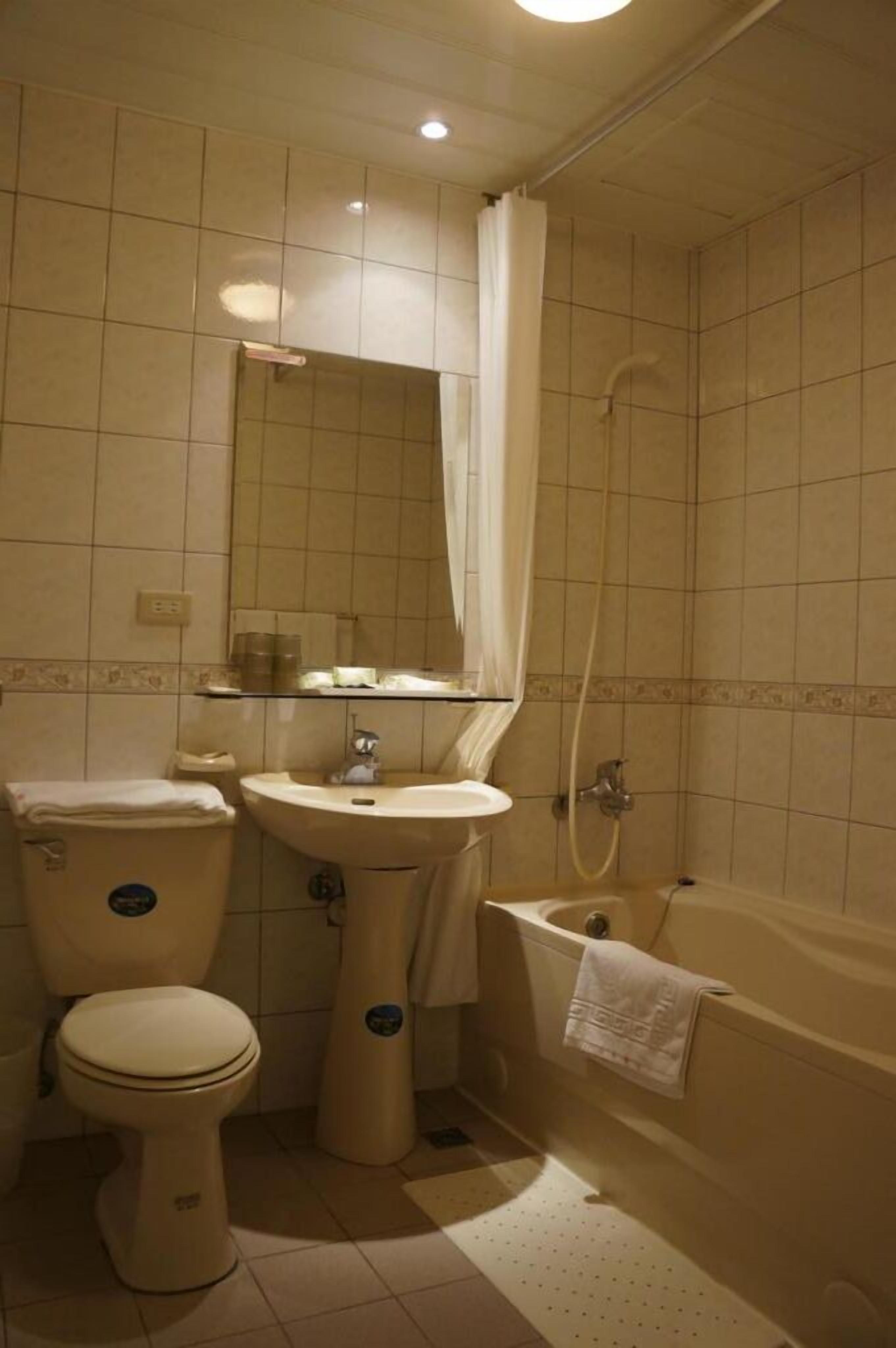 free toiletries, hair dryer, slippers, towels