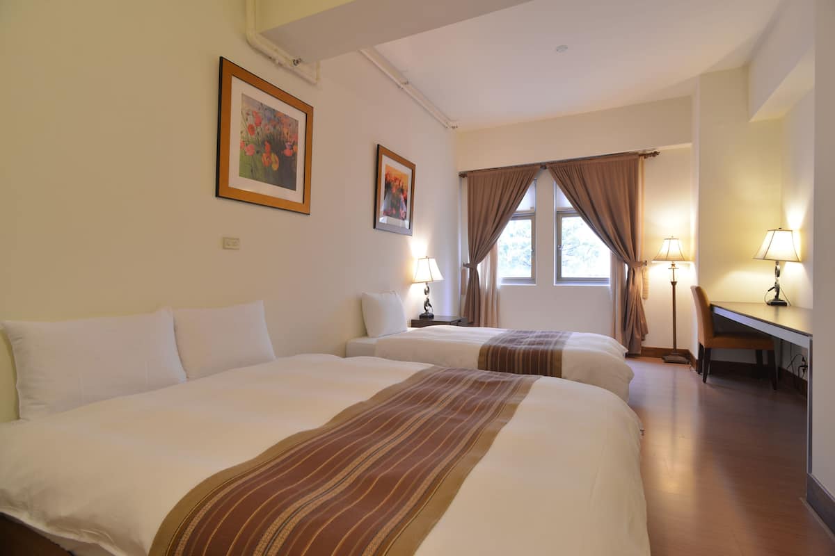 Blackout curtains, iron/ironing board, rollaway beds, free WiFi