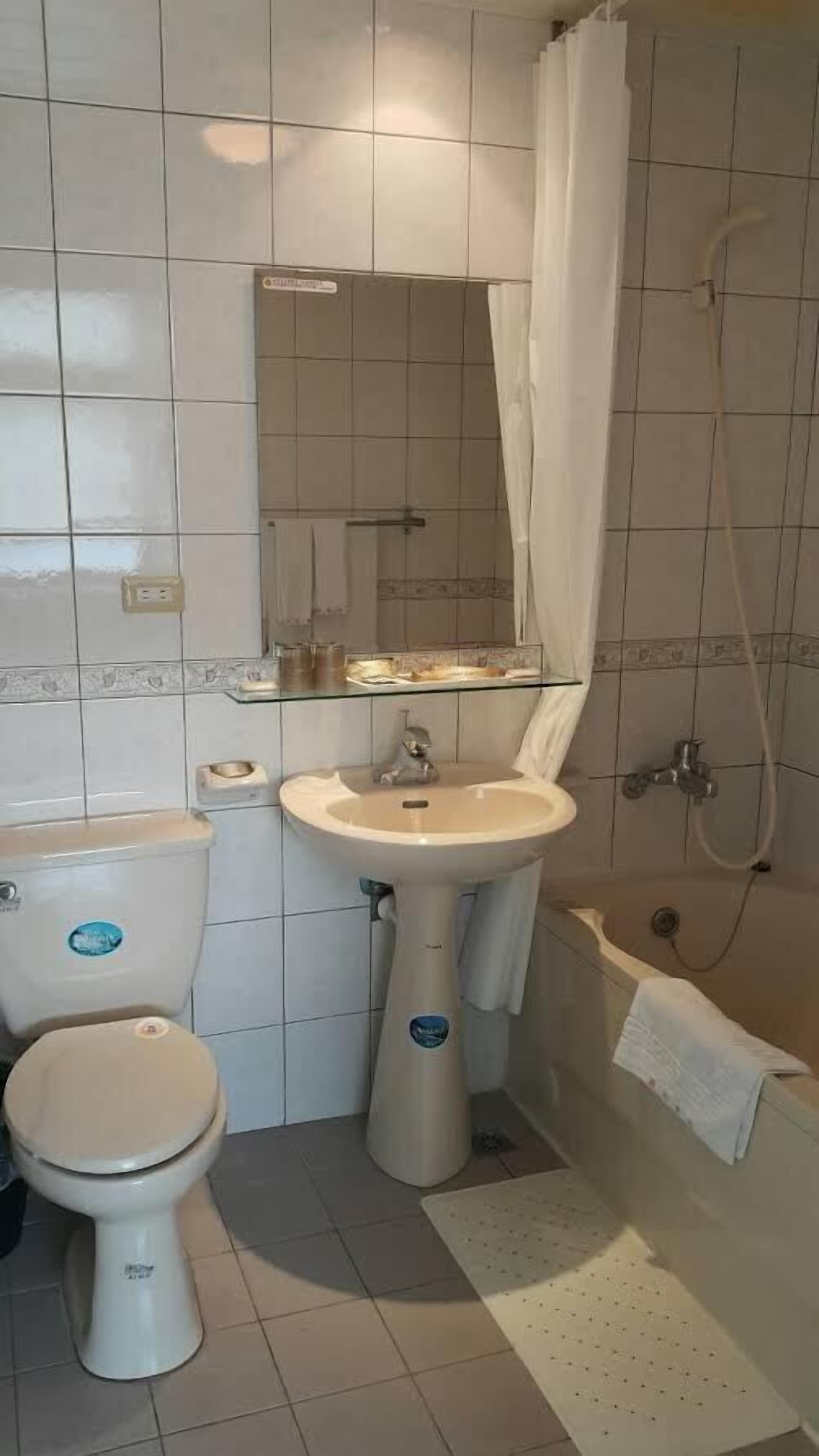 free toiletries, hair dryer, slippers, towels