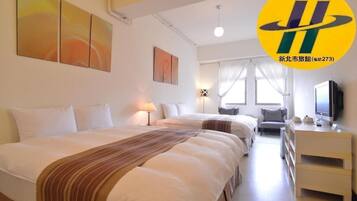 Blackout curtains, iron/ironing board, rollaway beds, free WiFi