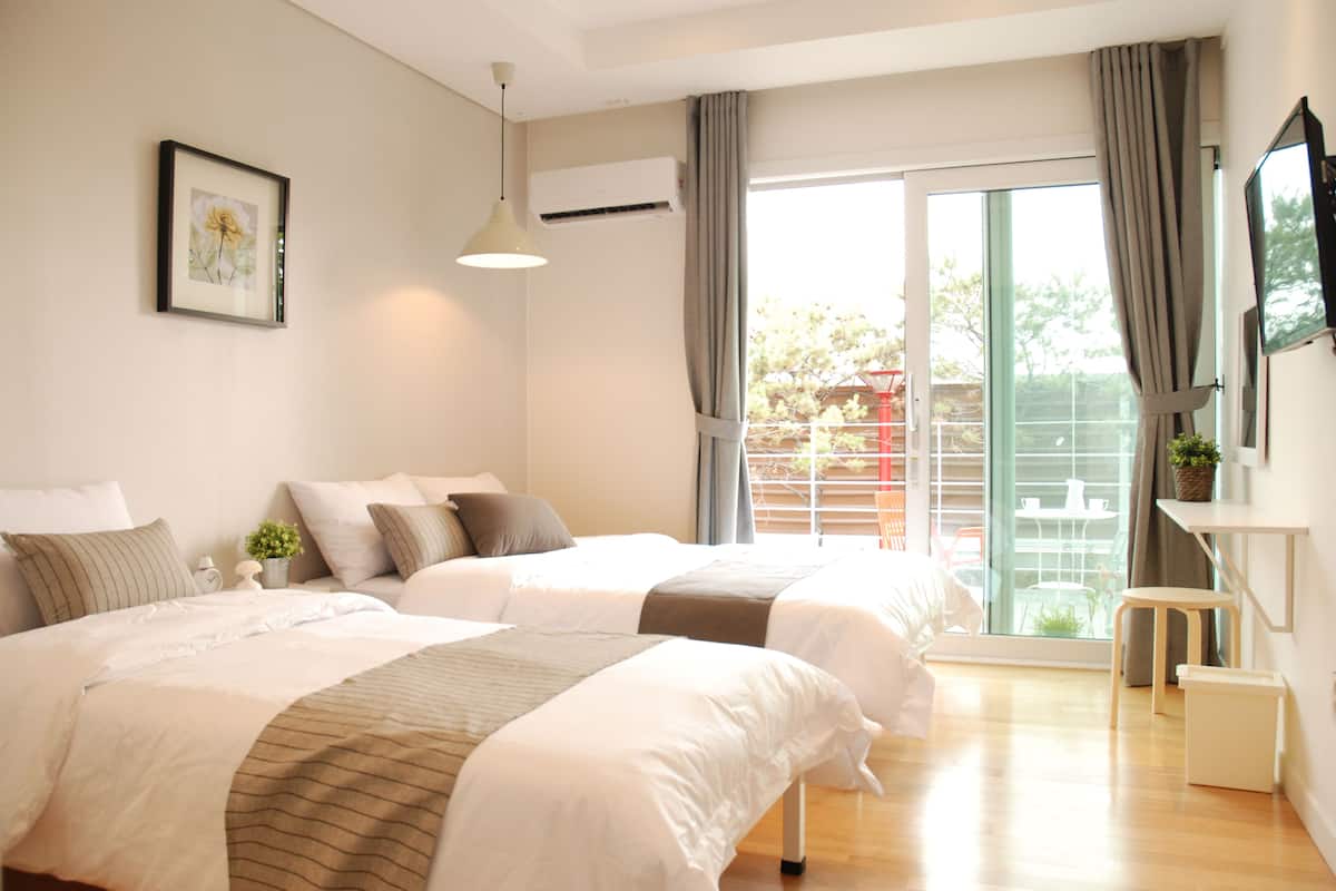Quarto triplo premium, terraço (Ba) | Roupas de cama premium, Wi-Fi de cortesia, roupa de cama