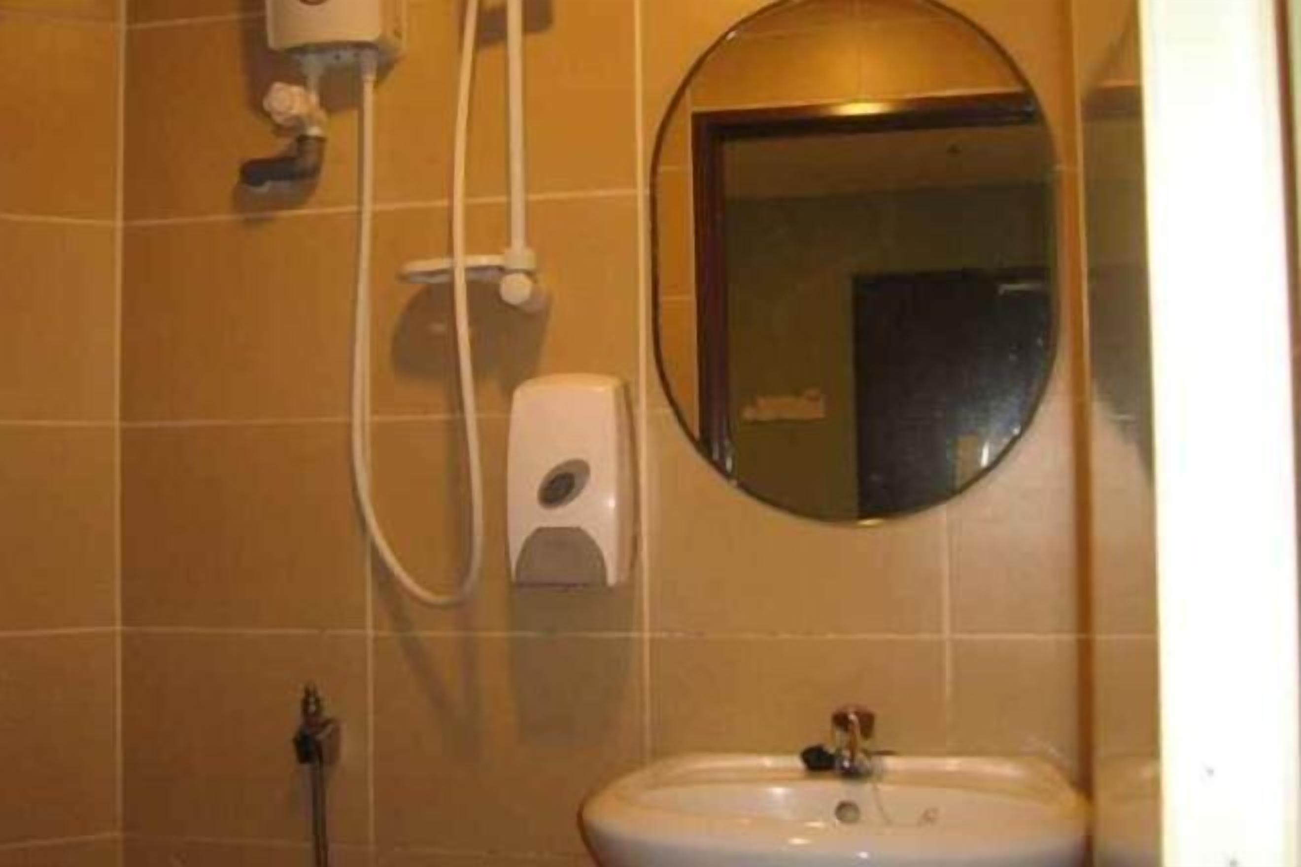 Shower, slippers, bidet, towels