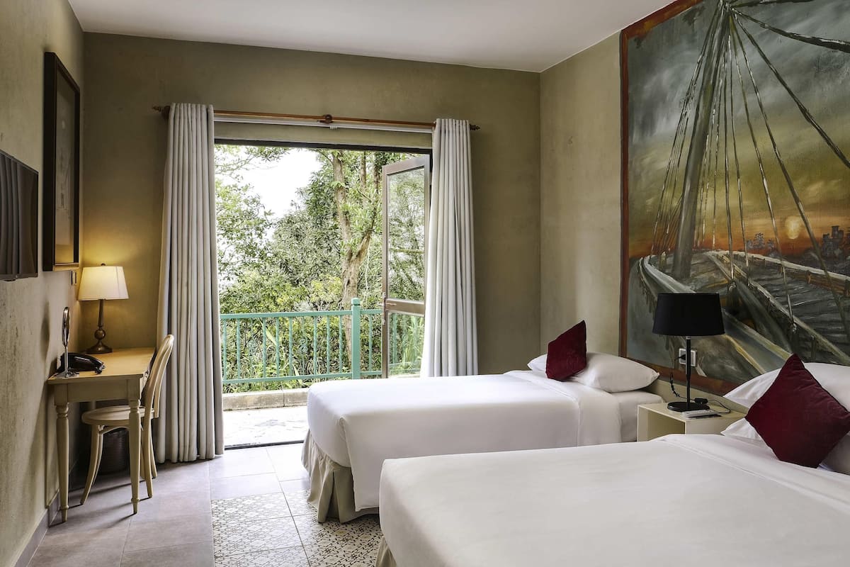 Family Deluxe, 1 King Bed and 1 Single Bed | 1 bedroom, in-room safe, individually furnished, desk