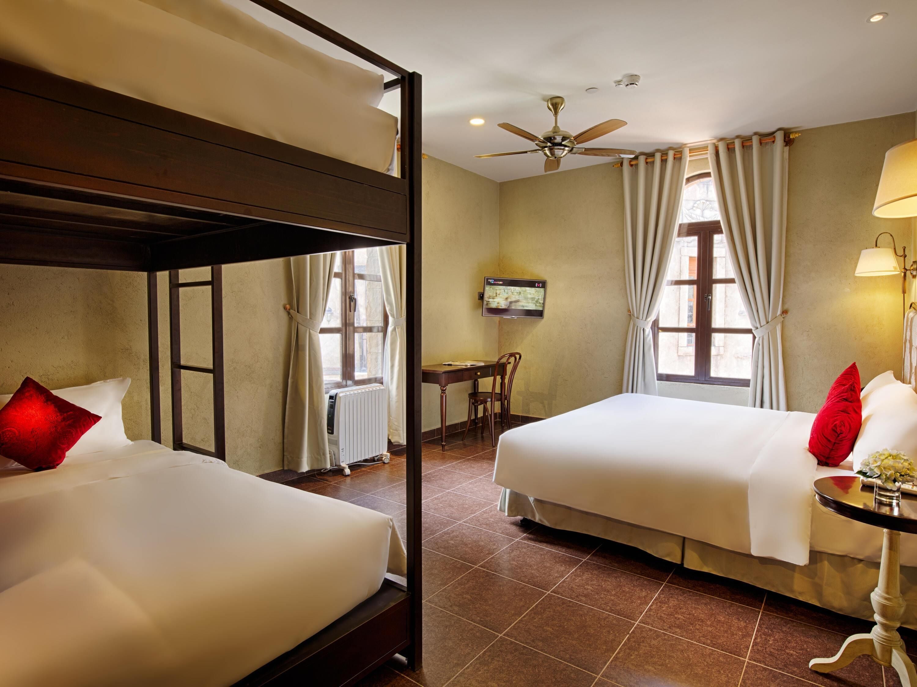 Family Room, Multiple Beds (1 King & 1 Twin Bunk Bed) | In-room safe, individually furnished, desk, laptop workspace