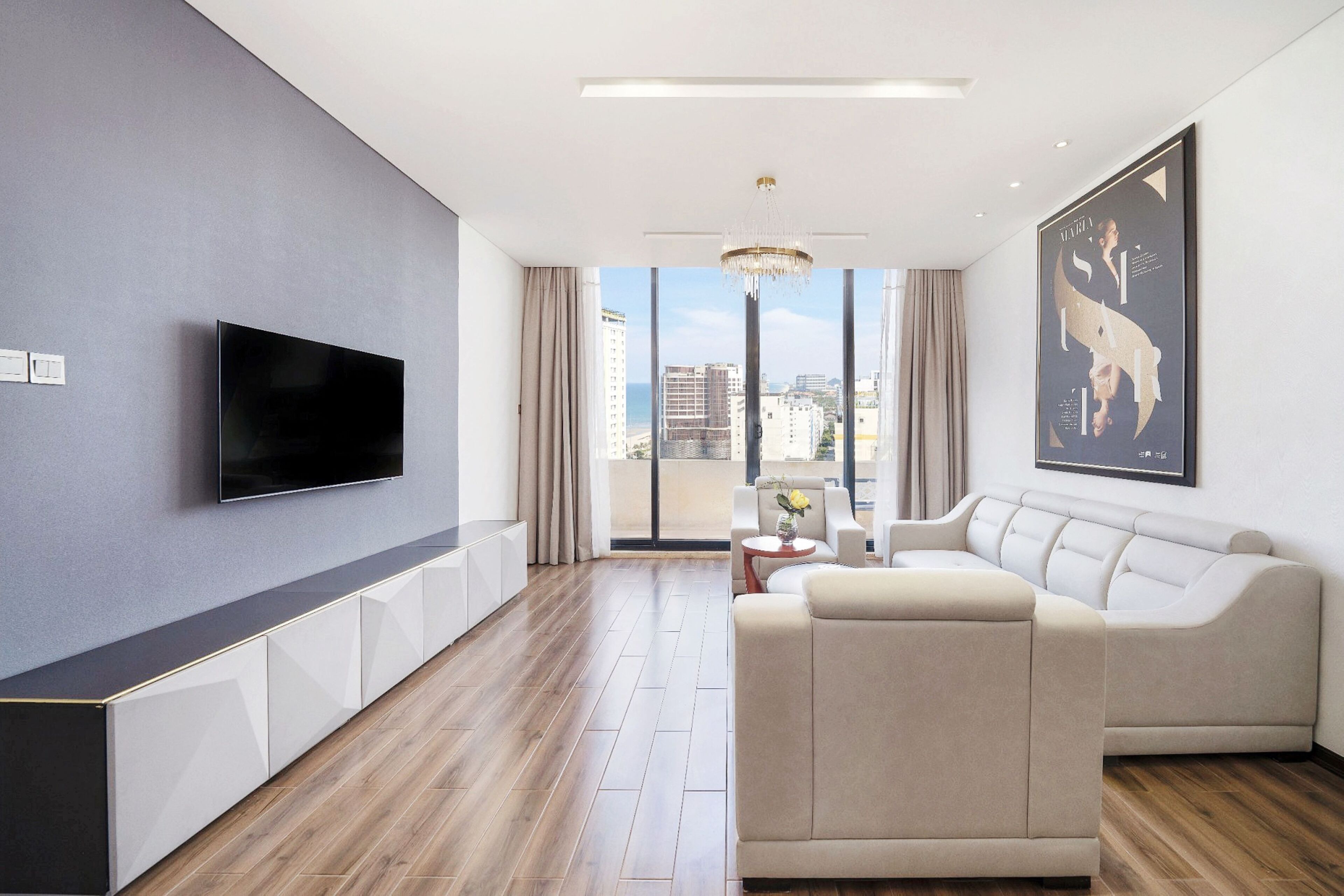 Penthouse Two-bedroom Free One-way Airport Transfer | Living area | 40-inch flat-screen TV with cable channels, TV