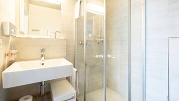 Shower, eco-friendly toiletries, hair dryer, towels
