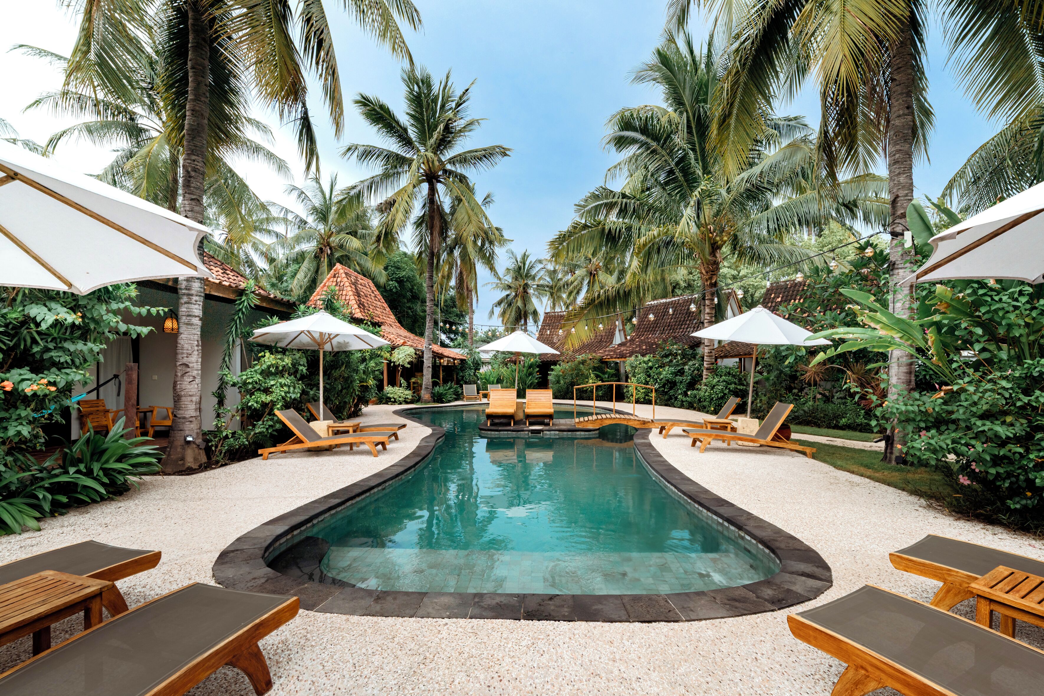 outdoor pool, pool umbrellas, pool loungers