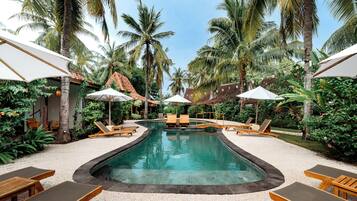 Outdoor pool, pool umbrellas, sun loungers