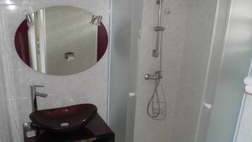 Shower, free toiletries, hair dryer, towels