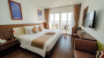 Deluxe Double Room, River View | Minibar, in-room safe, desk, blackout curtains