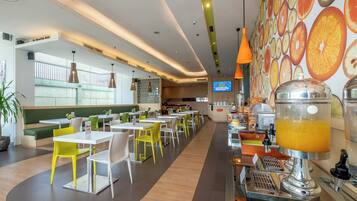 Breakfast, lunch, dinner served; international cuisine