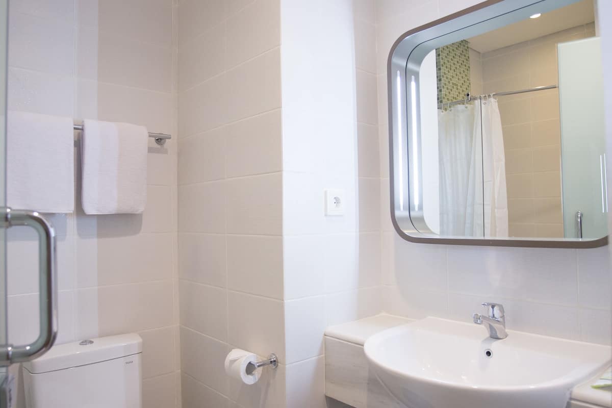 shower, free toiletries, hair dryer, bathrobes