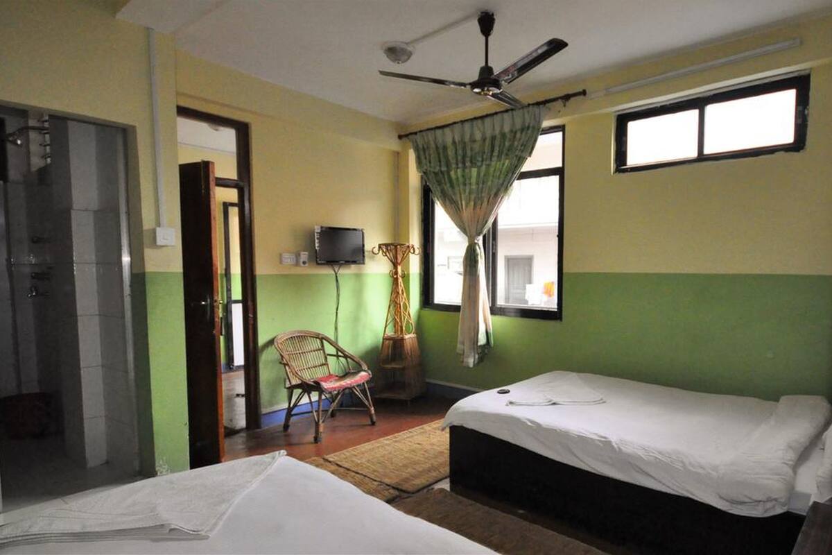 family studio, multiple beds, city view | in-room safe, desk, iron/ironing board, bed sheets