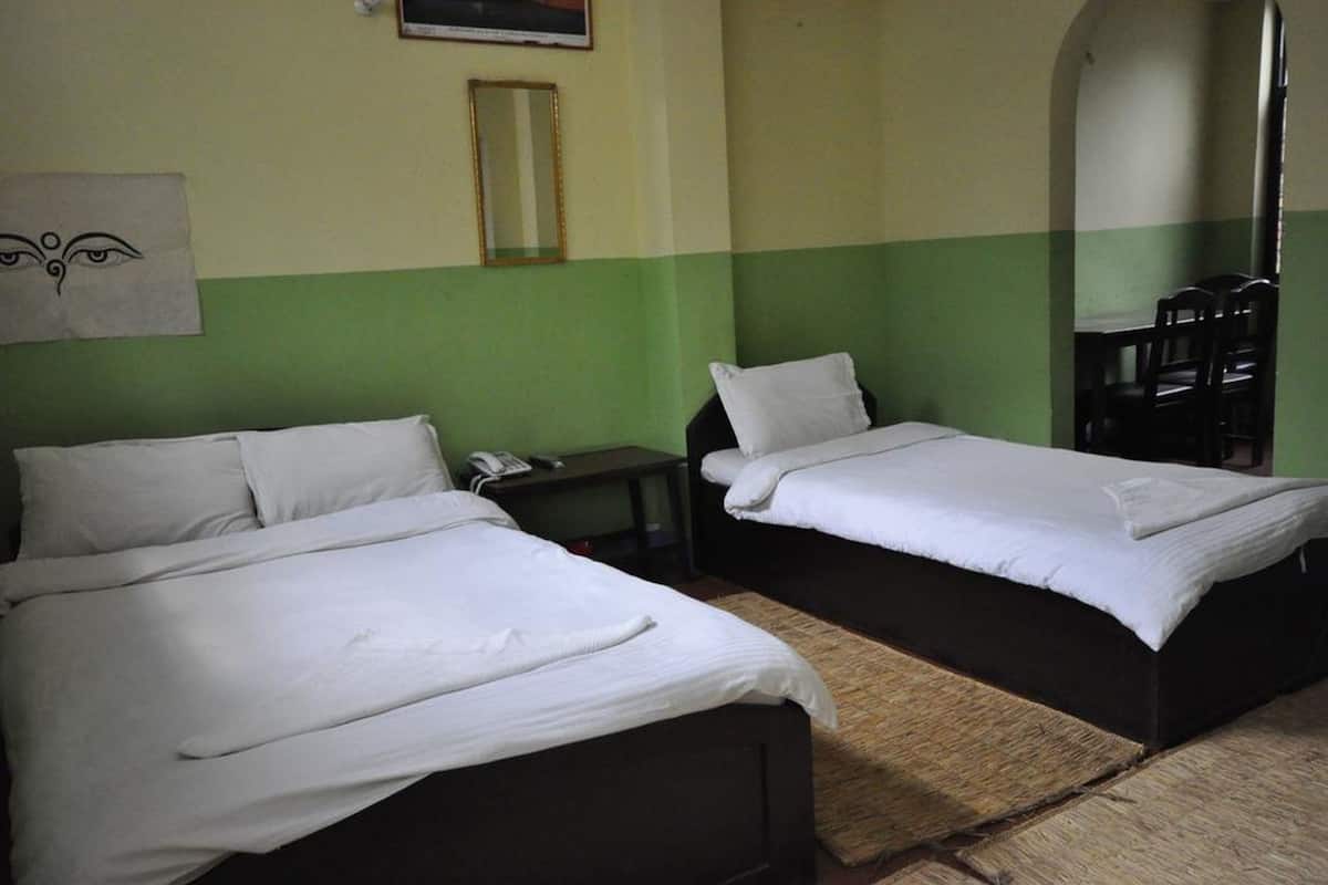 family studio, multiple beds, city view | in-room safe, desk, iron/ironing board, bed sheets