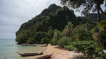 On the beach, white sand, beach massages, beach yoga