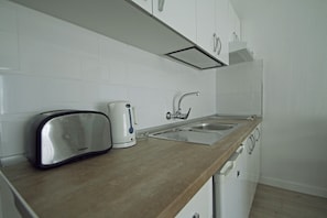 Fridge, microwave, coffee/tea maker, electric kettle