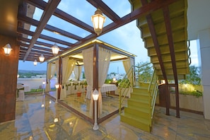 Outdoor dining - Hotel J P International (Chhatrapati Sambhajinagar)
