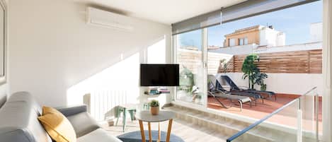 Superior Duplex, 3 Bedrooms, Terrace | Living area | 43-inch Smart TV with digital channels